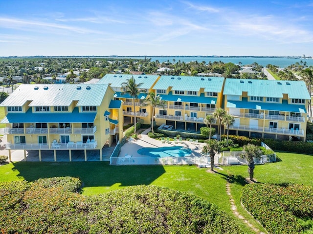 birds eye view of property featuring a water view