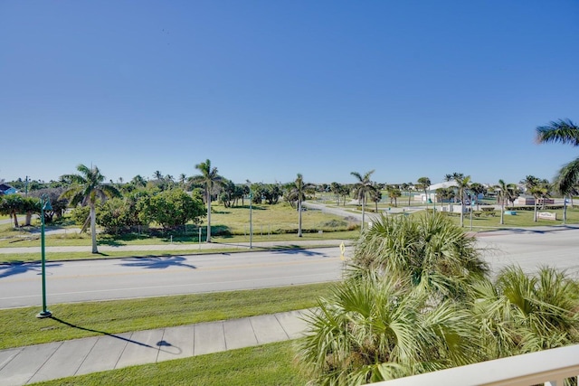 view of home's community featuring a yard