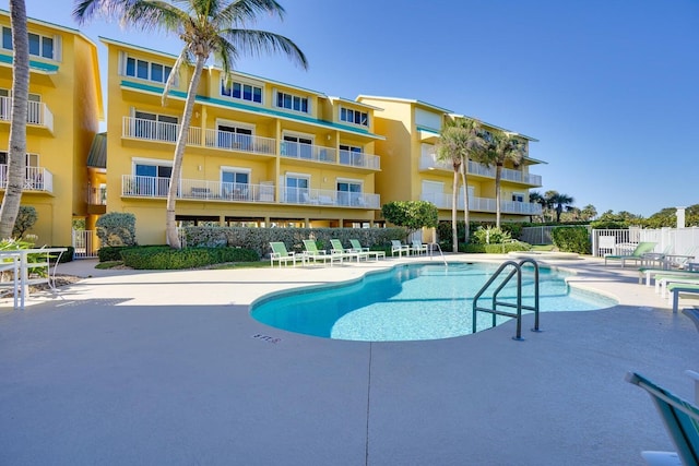 view of swimming pool with a patio area