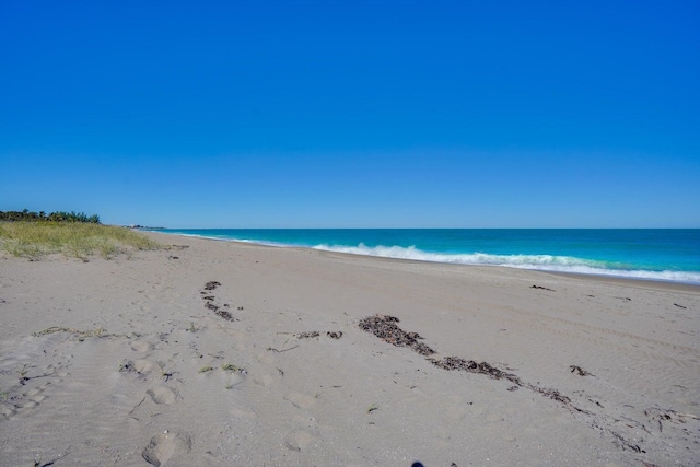 property view of water featuring a view of the beach