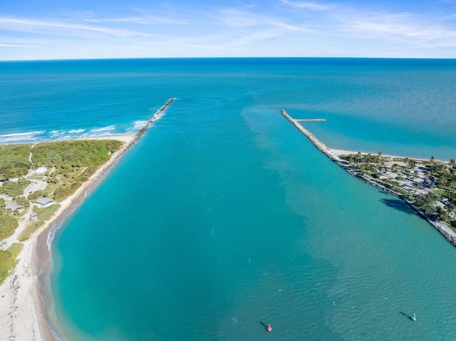 drone / aerial view with a view of the beach and a water view