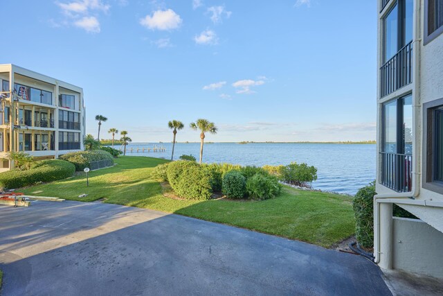 drone / aerial view featuring a water view