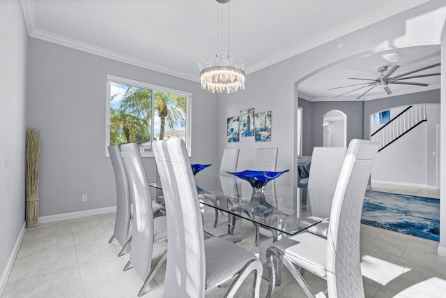 11158 Mainsail Ct, Wellington, FL 33449 - dining room with arched walkways, ornamental molding, baseboards, a ceiling fan, and light tile patterned floors