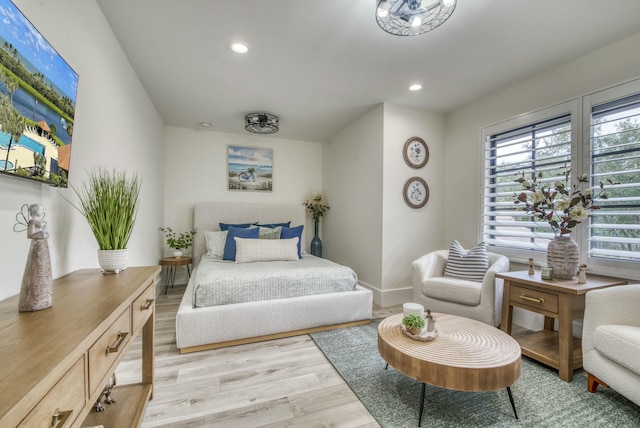 bedroom featuring light hardwood / wood-style floors