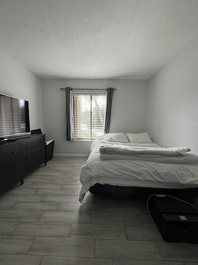 bedroom with a textured ceiling