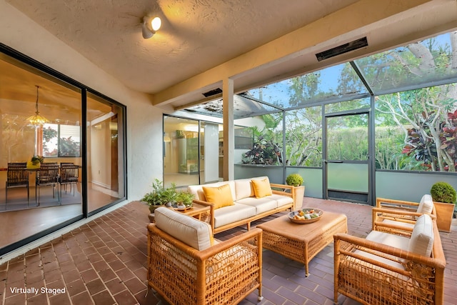 sunroom featuring a wealth of natural light