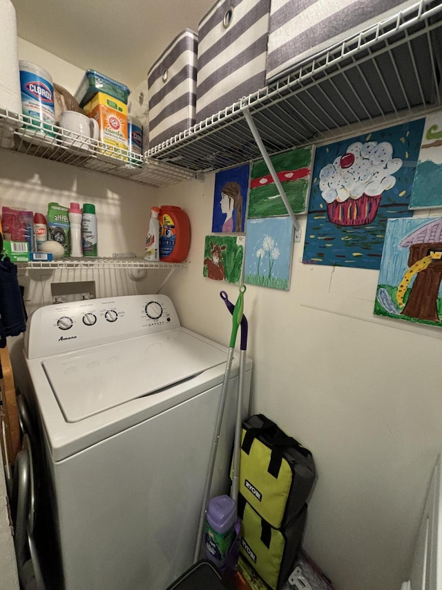 laundry room with washer / dryer