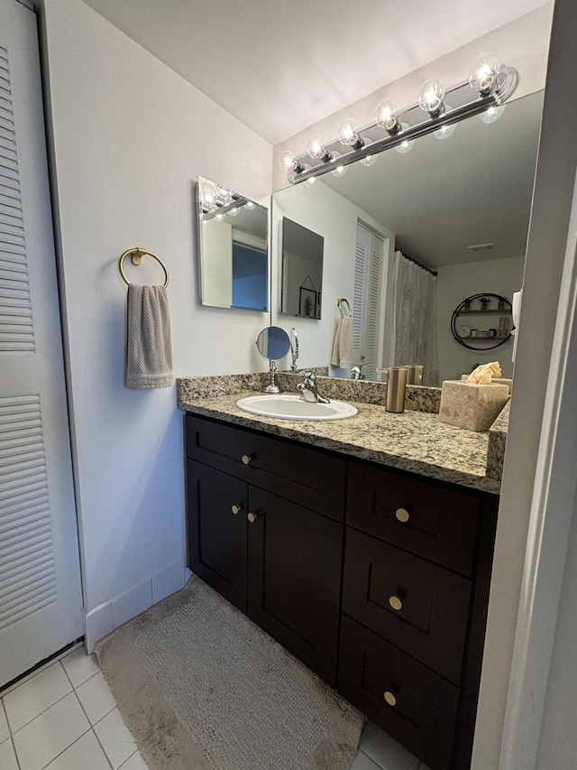 bathroom featuring vanity and tile patterned floors