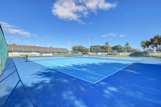 view of tennis court with basketball court