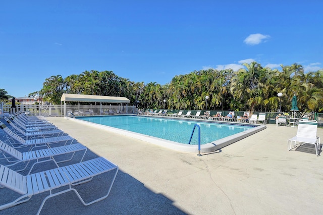 view of swimming pool featuring a patio