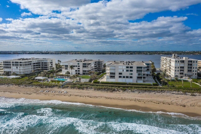 aerial view featuring a water view and a beach view