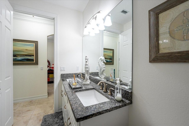 bathroom featuring tile patterned floors, vanity, and ornamental molding