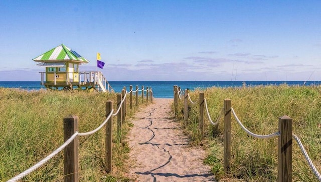 water view featuring a beach view