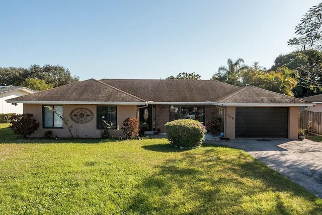 ranch-style house with a front yard and a garage