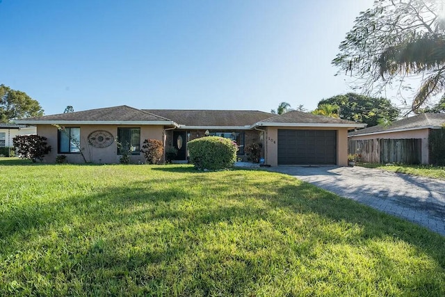 ranch-style house with a front yard and a garage