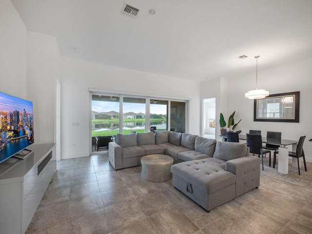 living room featuring a water view