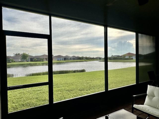 sunroom with a water view