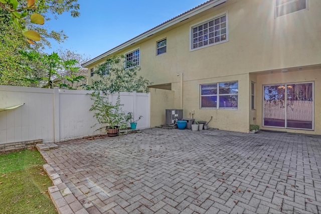 exterior space featuring central AC unit