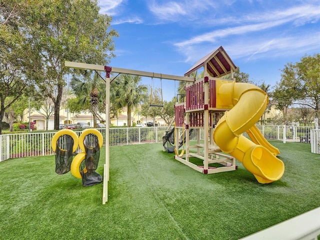 view of playground featuring a lawn