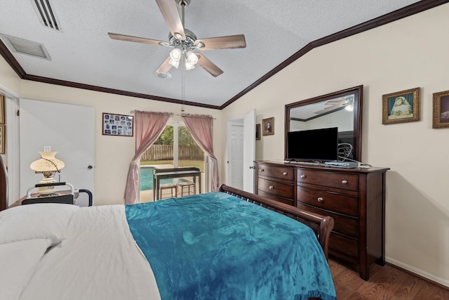 bedroom with vaulted ceiling, hardwood / wood-style flooring, ceiling fan, ornamental molding, and a textured ceiling