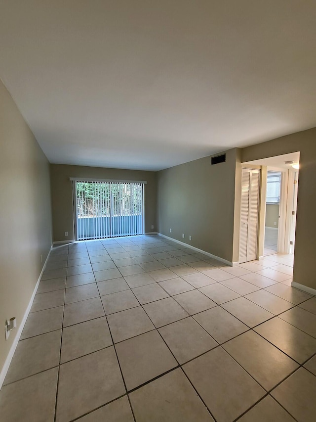 view of tiled spare room