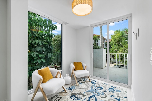 living area with expansive windows and a wealth of natural light