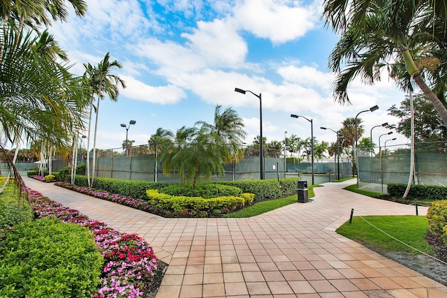 view of community with tennis court