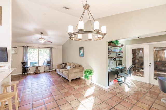 tiled living room with lofted ceiling, french doors, and ceiling fan with notable chandelier