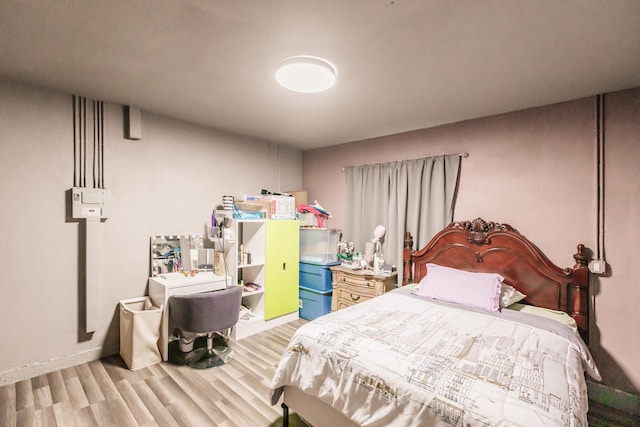 bedroom featuring light hardwood / wood-style floors