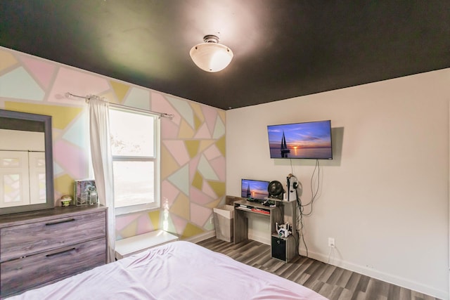 bedroom featuring dark wood-type flooring