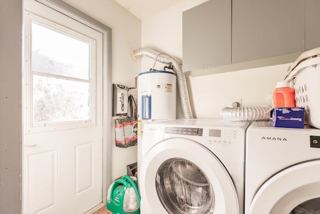 laundry area featuring washing machine and dryer