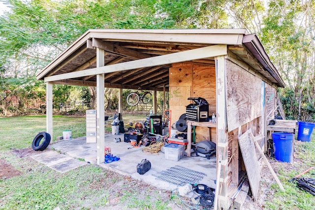 view of patio with an outdoor structure