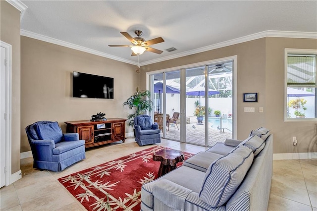 living room featuring ceiling fan, light tile patterned floors, and ornamental molding