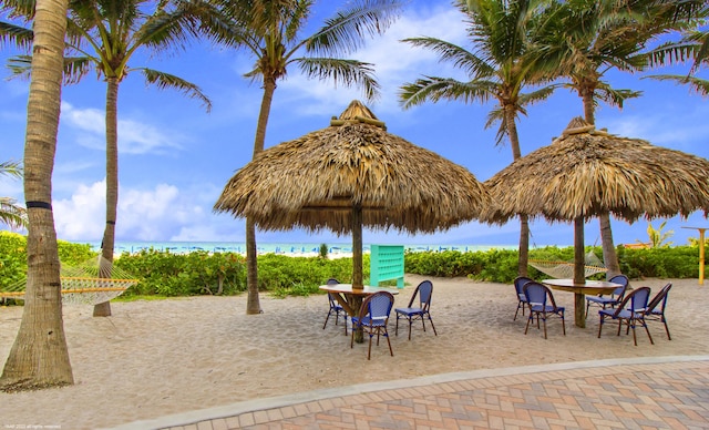 view of patio with a water view