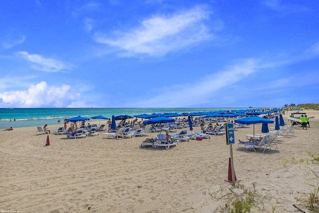 property view of water featuring a beach view