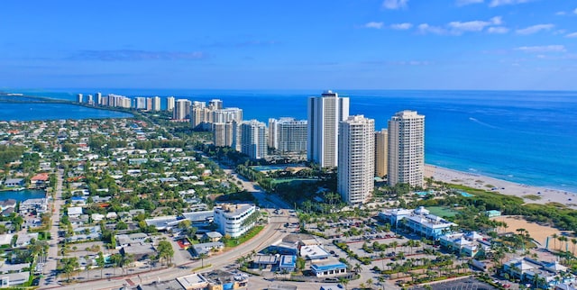 aerial view featuring a water view and a beach view