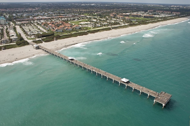 aerial view featuring a water view and a view of the beach