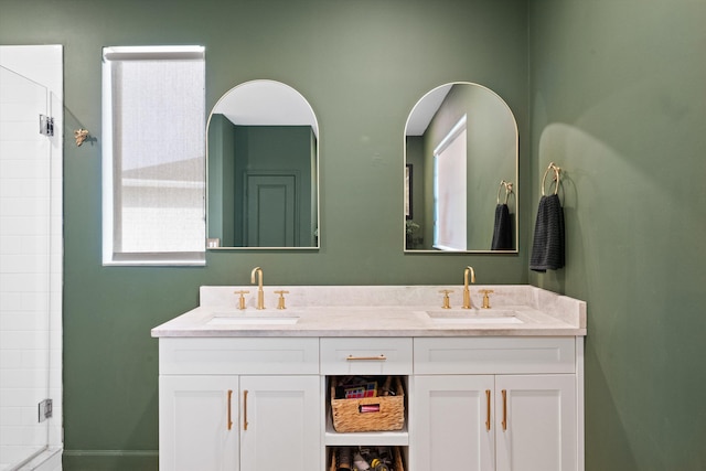 bathroom with vanity and walk in shower