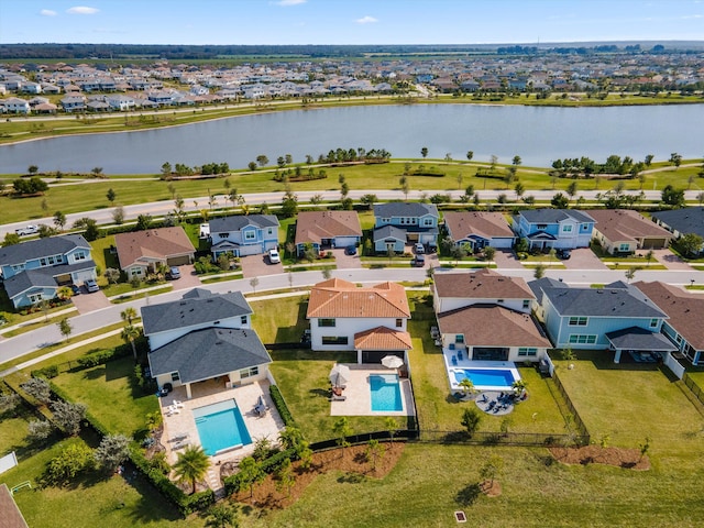 drone / aerial view featuring a water view