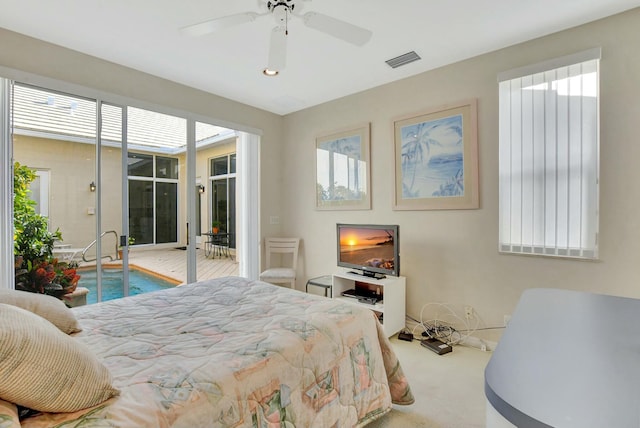 bedroom featuring access to exterior, carpet floors, and ceiling fan