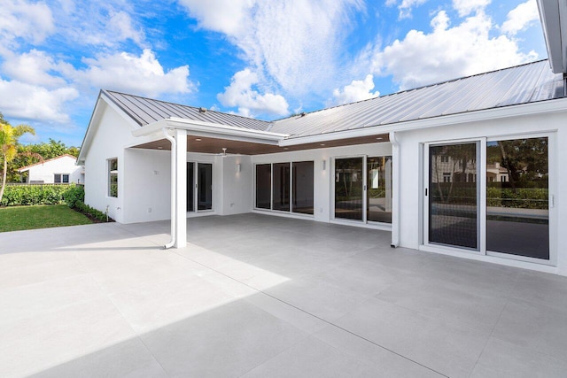 rear view of property with a patio