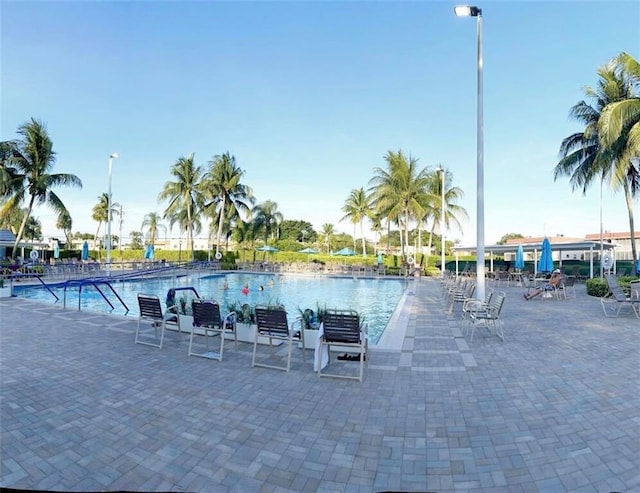 community pool featuring a patio area