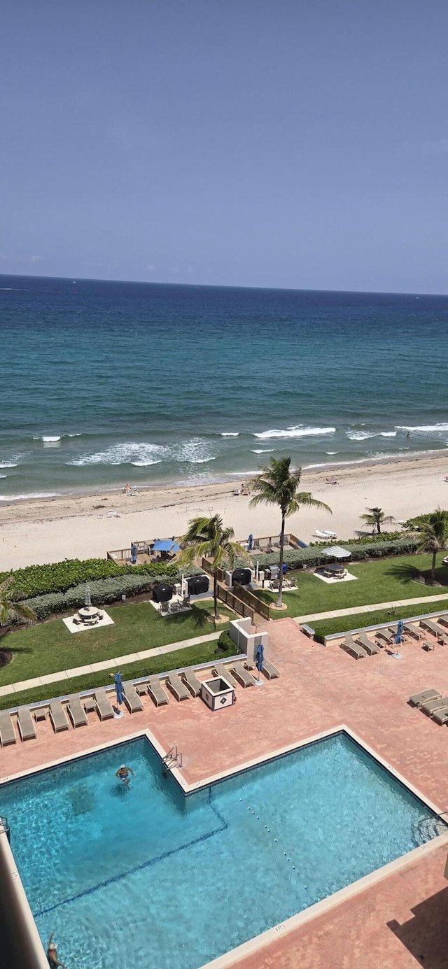 1149 Hillsboro Mile Unit 908, Hillsboro Beach, FL 33062 - community pool with view of water and beach and a patio