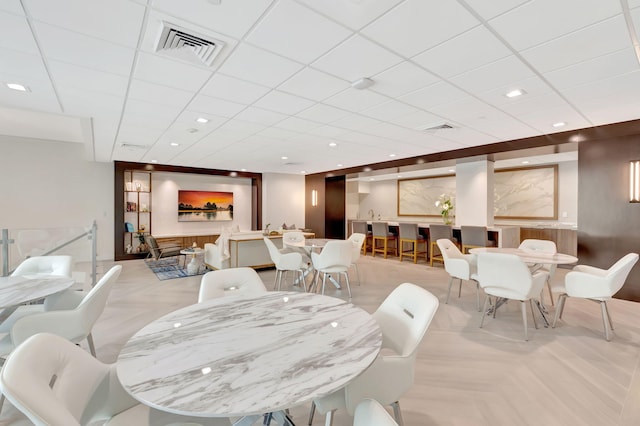 dining room with light parquet floors