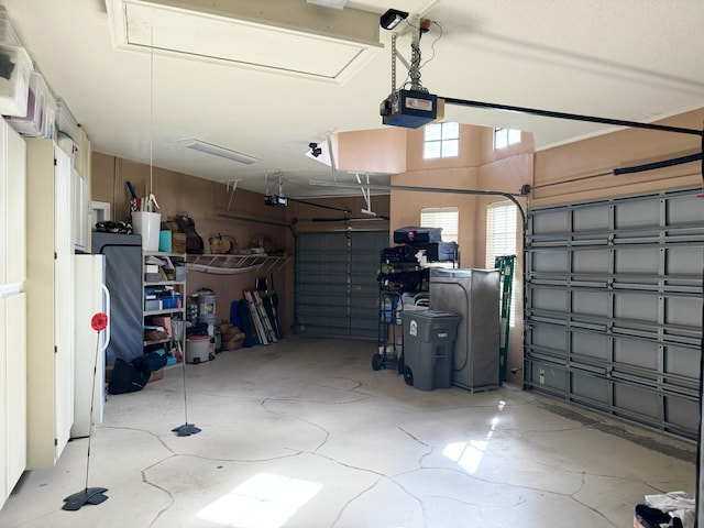 garage featuring a garage door opener