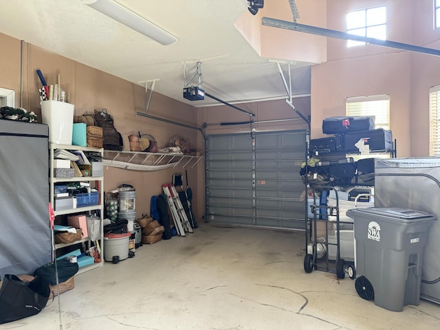 garage featuring a garage door opener