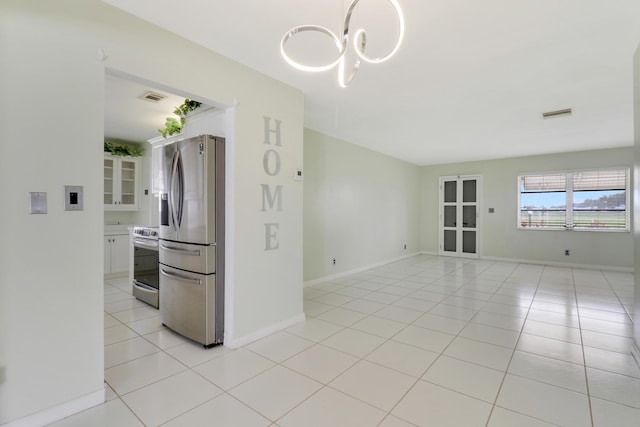 interior space featuring a chandelier