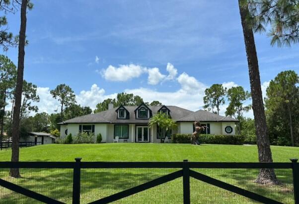 view of front of home with a front yard