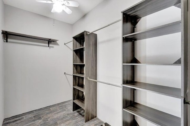 spacious closet with ceiling fan