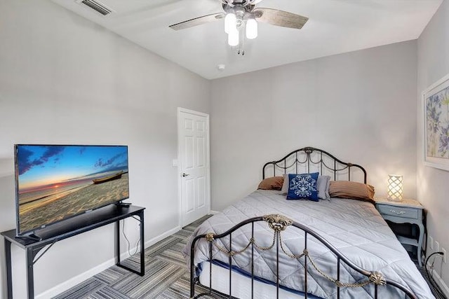 bedroom featuring ceiling fan and parquet flooring